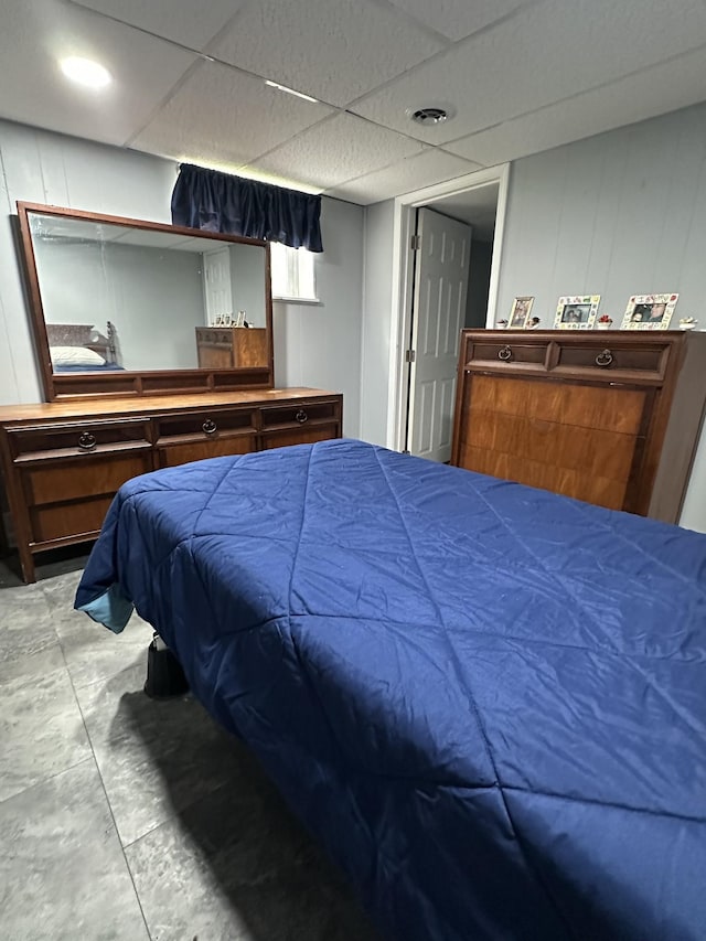 2364 Skyview Dr, Centerville, TN 37033 - bedroom featuring a paneled ceiling and concrete floors