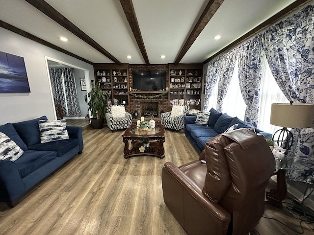 2364 Skyview Dr, Centerville, TN 37033 - living area with beamed ceiling, wood finished floors, a brick fireplace, and recessed lighting