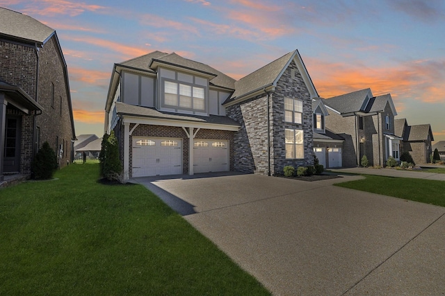4337 Peacemill Ln, Murfreesboro, TN 37128 - view of front of house featuring driveway, a garage, a lawn, and stucco siding