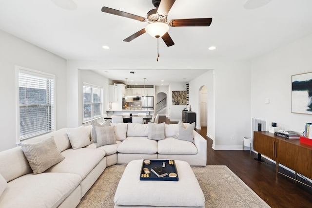 4337 Peacemill Ln, Murfreesboro, TN 37128 - living area with wood finished floors, ceiling fan, baseboards, recessed lighting, and arched walkways