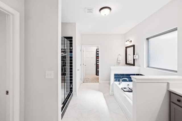 4337 Peacemill Ln, Murfreesboro, TN 37128 - full bathroom featuring marble look tile flooring, vanity, a bath, and a spacious closet