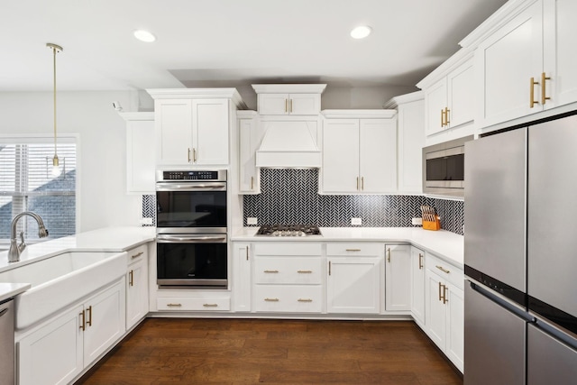4337 Peacemill Ln, Murfreesboro, TN 37128 - kitchen with appliances with stainless steel finishes, recessed lighting, tasteful backsplash, light countertops, and white cabinets