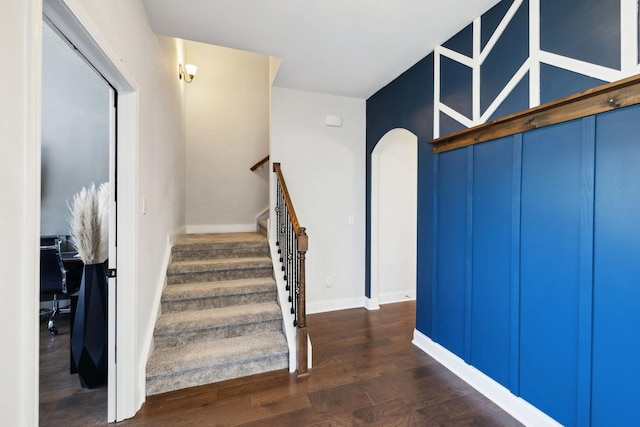 4337 Peacemill Ln, Murfreesboro, TN 37128 - staircase featuring arched walkways, wood finished floors, and baseboards