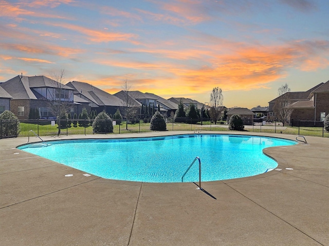 4337 Peacemill Ln, Murfreesboro, TN 37128 - pool at dusk with a residential view, a community pool, and a patio
