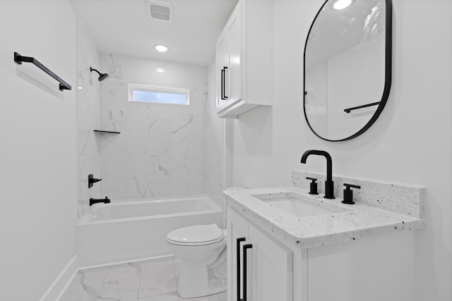 199 Beach Rd N, Killen, AL 35645 - full bathroom featuring vanity, marble finish floors, toilet,  shower combination, and baseboards