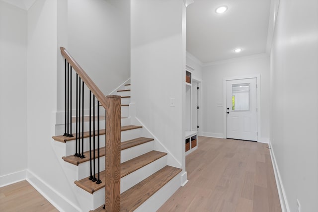 199 Beach Rd N, Killen, AL 35645 - foyer featuring light wood-style floors, baseboards, recessed lighting, ornamental molding, and stairway
