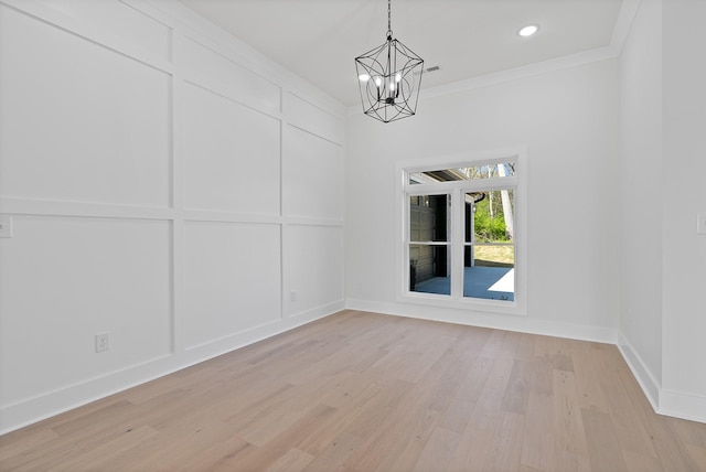 199 Beach Rd N, Killen, AL 35645 - unfurnished dining area with a chandelier, light wood finished floors, baseboards, crown molding, and recessed lighting