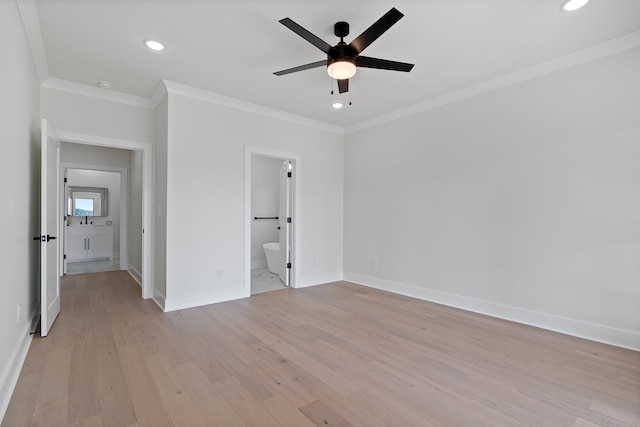 199 Beach Rd N, Killen, AL 35645 - unfurnished bedroom featuring recessed lighting, light wood-type flooring, ornamental molding, baseboards, and ensuite bathroom