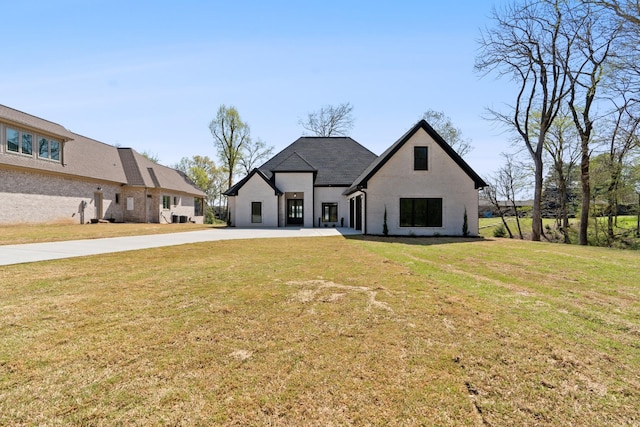199 Beach Rd N, Killen, AL 35645 - view of front facade featuring a front lawn and driveway