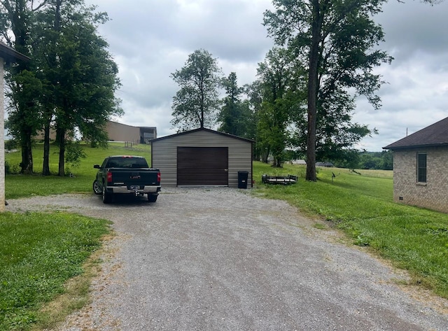 460 Armstrong Rd, Castalian Springs, TN 37031 - detached garage with gravel driveway