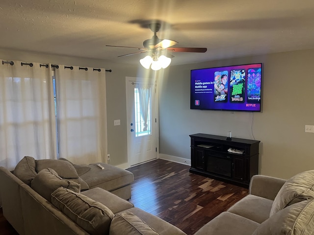 460 Armstrong Rd, Castalian Springs, TN 37031 - living room featuring dark wood finished floors, ceiling fan, and baseboards