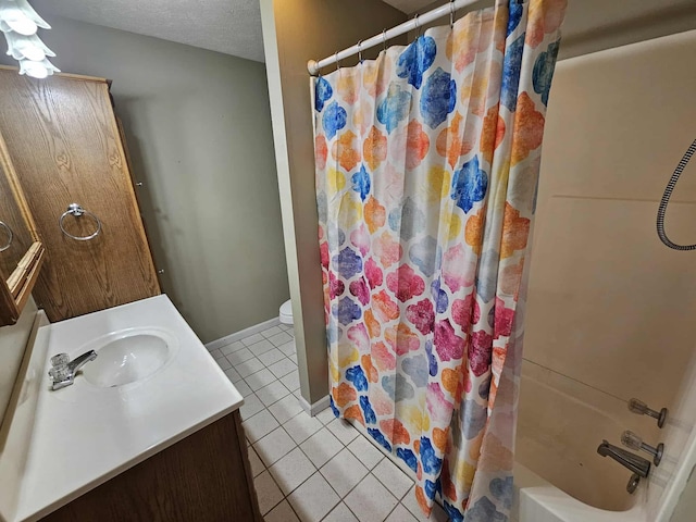 102 Hazelnut Ave, Camden, TN 38320 - bathroom featuring tile patterned flooring, vanity, shower / tub combo, toilet, and baseboards