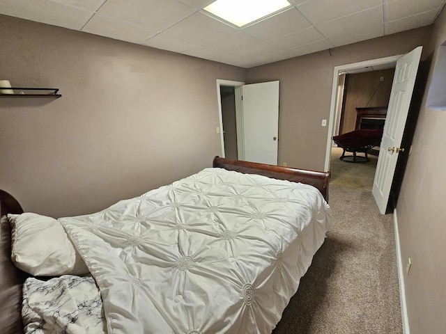 102 Hazelnut Ave, Camden, TN 38320 - bedroom with a paneled ceiling and carpet floors