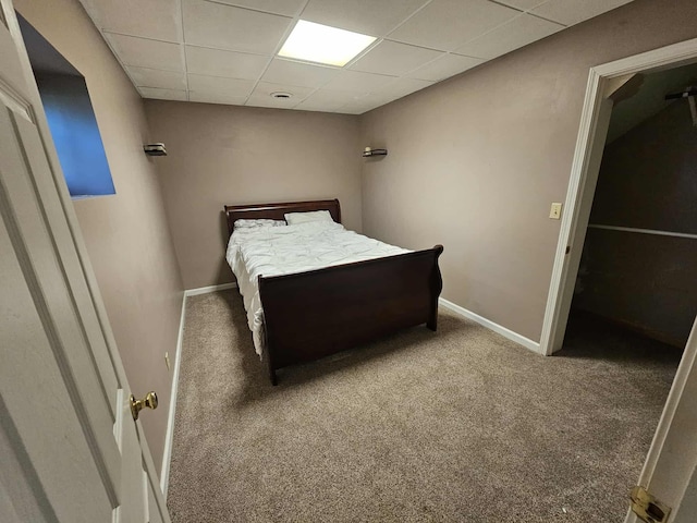 102 Hazelnut Ave, Camden, TN 38320 - carpeted bedroom featuring a paneled ceiling and baseboards