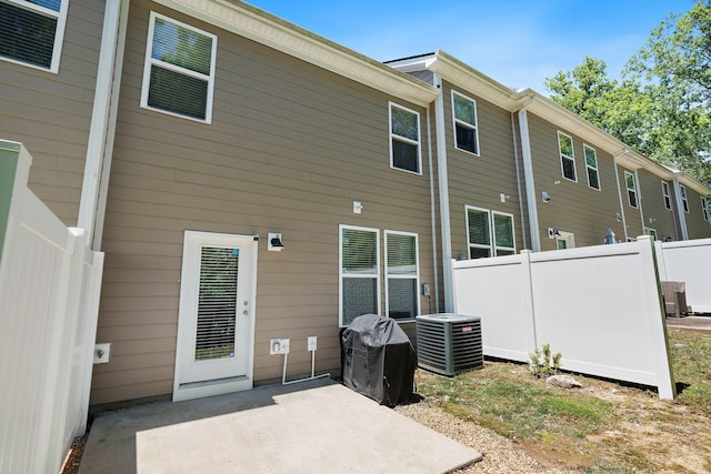 2717 Gossett Trl, Nashville, TN 37221 - back of house with a patio area and cooling unit