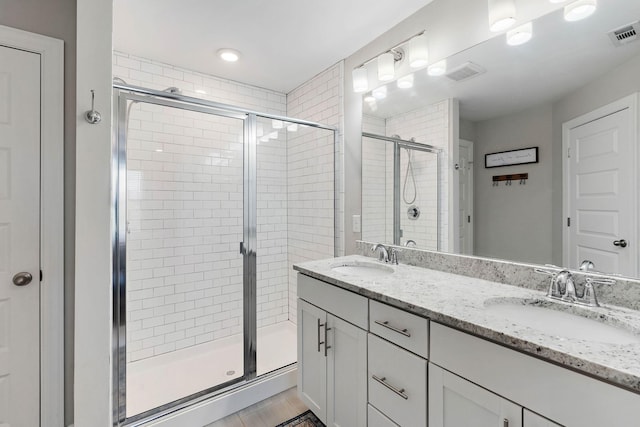 2717 Gossett Trl, Nashville, TN 37221 - full bathroom featuring a stall shower and double vanity