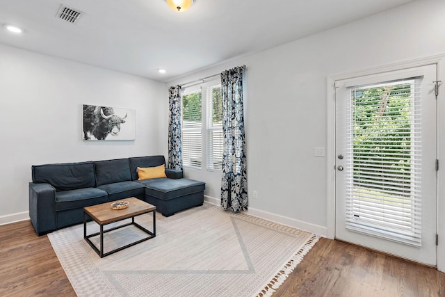 2717 Gossett Trl, Nashville, TN 37221 - living area featuring wood finished floors, baseboards, and recessed lighting