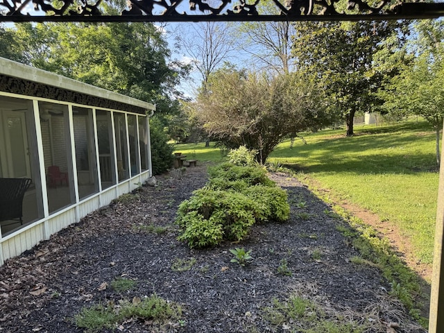 512 Utley Dr, Goodlettsville, TN 37072 - view of grassy yard with a sunroom and view of scattered trees
