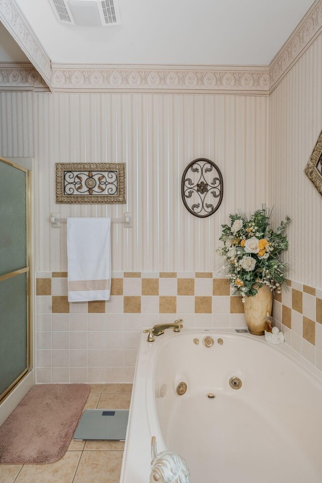 3871 Stevens Ln, Nashville, TN 37218 - full bath featuring a jetted tub, tile patterned flooring, a shower stall, and wallpapered walls