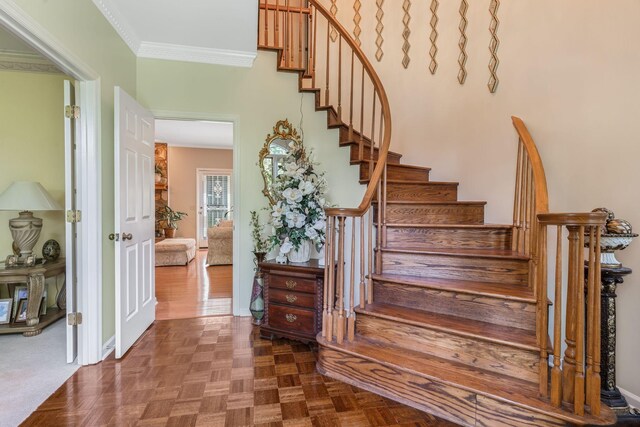 3871 Stevens Ln, Nashville, TN 37218 - stairs featuring crown molding and baseboards