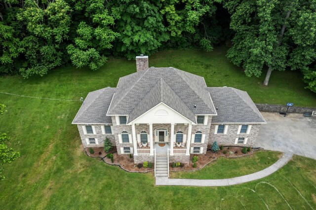 3871 Stevens Ln, Nashville, TN 37218 - view of front of house with a chimney and a front yard