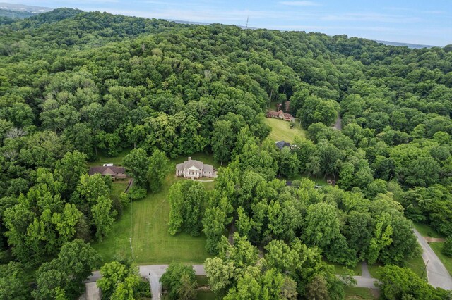 3871 Stevens Ln, Nashville, TN 37218 - aerial view of property and surrounding area with a heavily wooded area