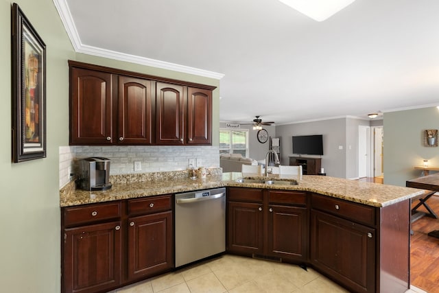 102 Mckinley Dr, Columbia, TN 38401 - kitchen with dishwasher, a sink, a peninsula, crown molding, and open floor plan