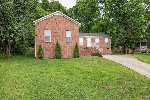 102 Mckinley Dr, Columbia, TN 38401 - view of front of home with brick siding and concrete driveway