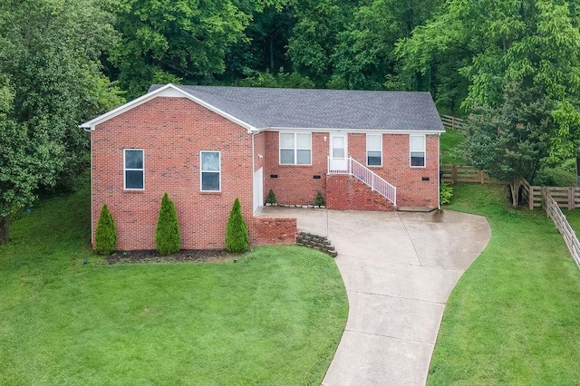 102 Mckinley Dr, Columbia, TN 38401 - ranch-style house featuring brick siding, driveway, and roof with shingles