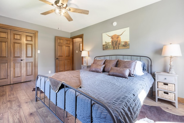 2890 Ellis Ln, Palmyra, TN 37142 - bedroom featuring wood finished floors and a ceiling fan