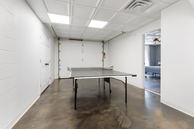2890 Ellis Ln, Palmyra, TN 37142 - recreation room featuring finished concrete flooring and baseboards