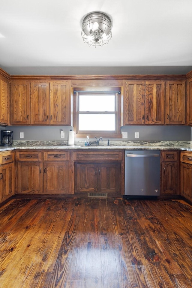 2890 Ellis Ln, Palmyra, TN 37142 - kitchen featuring dishwasher, a sink, brown cabinets, and dark wood-style floors