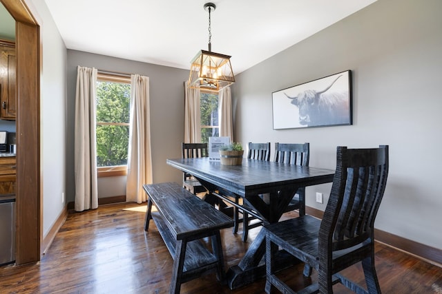 2890 Ellis Ln, Palmyra, TN 37142 - dining room with a chandelier, dark wood-style floors, and baseboards