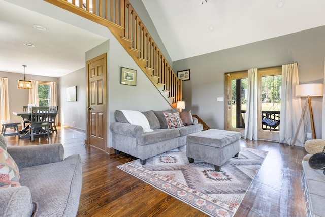 2890 Ellis Ln, Palmyra, TN 37142 - living area featuring wood finished floors, stairway, a high ceiling, baseboards, and recessed lighting