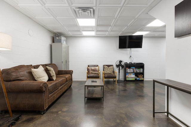 2890 Ellis Ln, Palmyra, TN 37142 - living room with concrete floors and concrete block wall