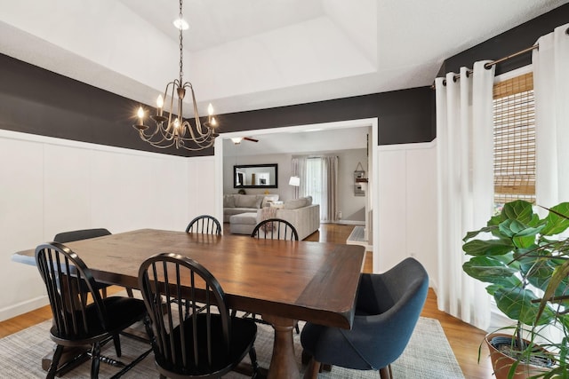 519 Glen Echo Dr, Old Hickory, TN 37138 - dining space with a chandelier, wood finished floors, and a decorative wall