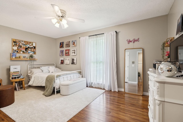 519 Glen Echo Dr, Old Hickory, TN 37138 - bedroom featuring wood finished floors, a textured ceiling, and a ceiling fan