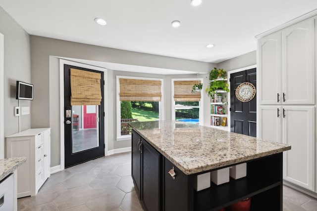 519 Glen Echo Dr, Old Hickory, TN 37138 - kitchen with healthy amount of natural light, white cabinets, light stone counters, and recessed lighting