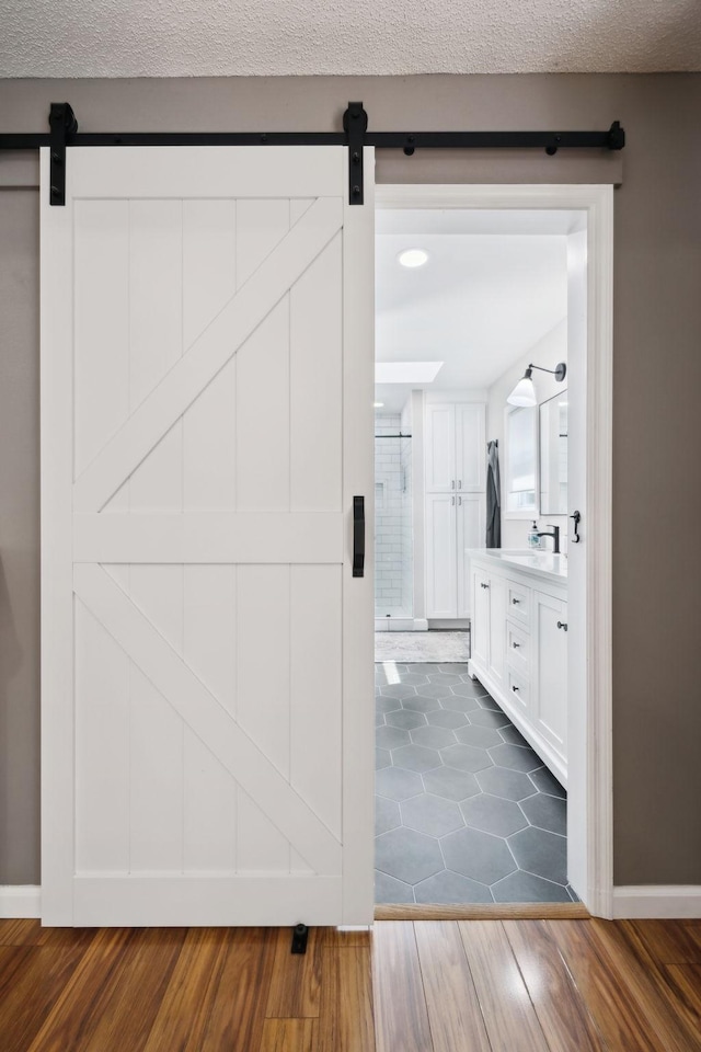 519 Glen Echo Dr, Old Hickory, TN 37138 - bathroom featuring vanity, wood finished floors, and baseboards