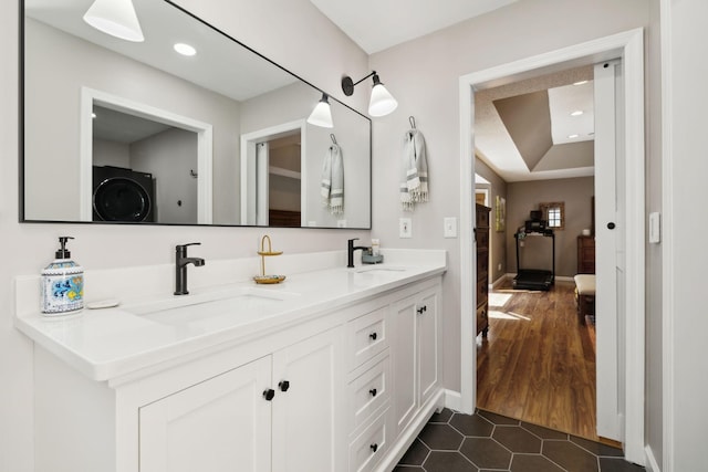 519 Glen Echo Dr, Old Hickory, TN 37138 - full bath featuring double vanity, tile patterned flooring, recessed lighting, washer / dryer, and baseboards