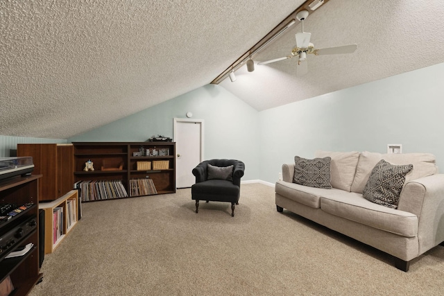 519 Glen Echo Dr, Old Hickory, TN 37138 - living area with carpet flooring, a textured ceiling, track lighting, vaulted ceiling, and ceiling fan