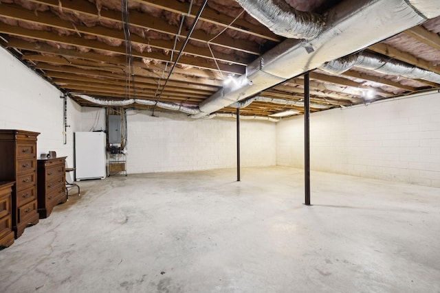 519 Glen Echo Dr, Old Hickory, TN 37138 - unfinished below grade area with freestanding refrigerator, electric panel, and concrete block wall