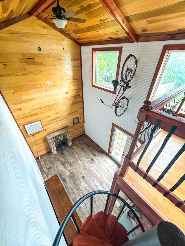 126 Carroll St S, Bruceton, TN 38317 - stairway featuring wooden walls, plenty of natural light, ceiling fan, wood finished floors, and wood ceiling
