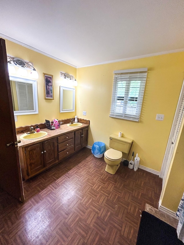 126 Carroll St S, Bruceton, TN 38317 - full bath with double vanity, toilet, crown molding, and baseboards