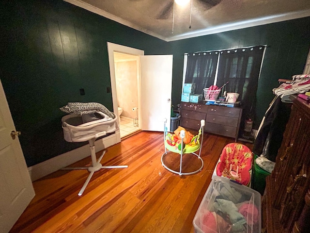 126 Carroll St S, Bruceton, TN 38317 - bedroom featuring wood finished floors and crown molding