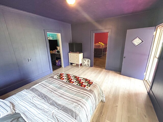 126 Carroll St S, Bruceton, TN 38317 - bedroom with wood finished floors