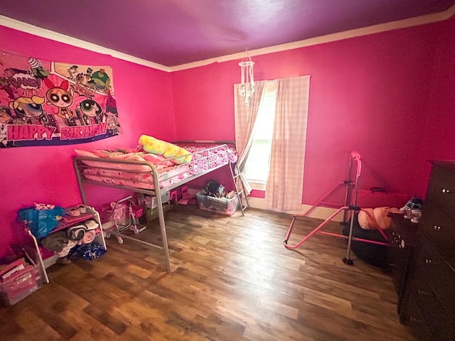 126 Carroll St S, Bruceton, TN 38317 - bedroom with wood finished floors and ornamental molding