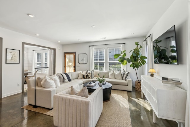 1609 Marsden Ave, Nashville, TN 37216 - living room featuring recessed lighting, concrete floors, and baseboards