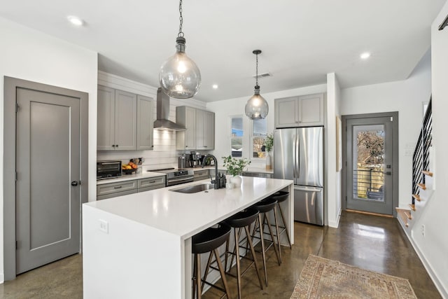 1609 Marsden Ave, Nashville, TN 37216 - kitchen featuring appliances with stainless steel finishes, a sink, gray cabinets, wall chimney exhaust hood, and healthy amount of natural light