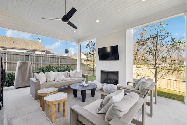 1609 Marsden Ave, Nashville, TN 37216 - fenced backyard featuring an outdoor living space with a fireplace, a patio area, and ceiling fan